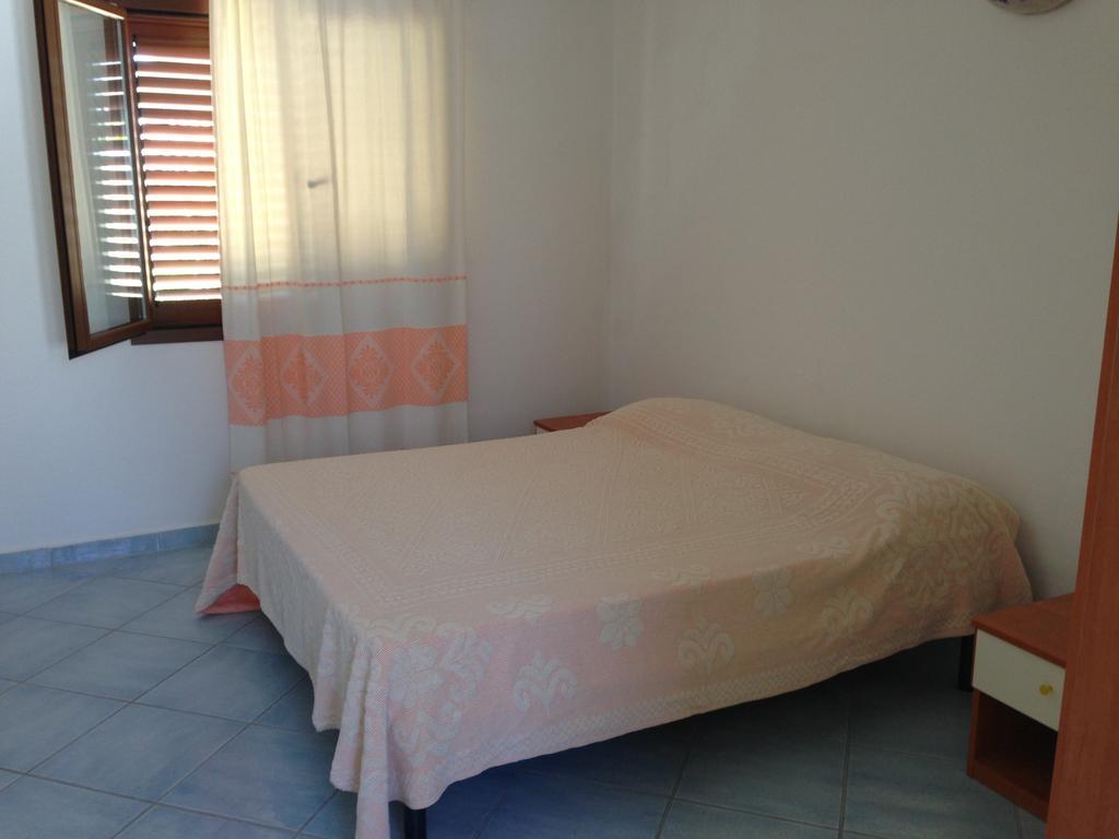 Case Vacanza Rosa Loiri Porto San Paolo Habitación foto